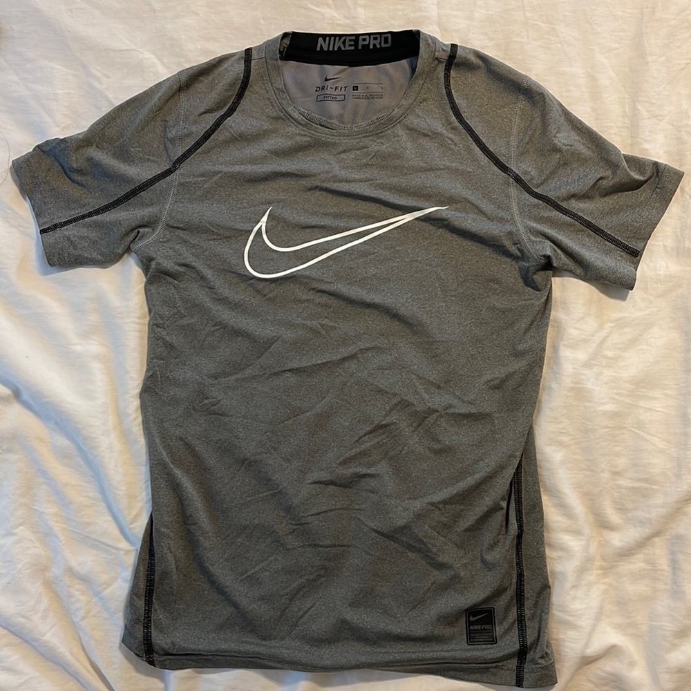 Large grey Nike fit shirt in kids Large.